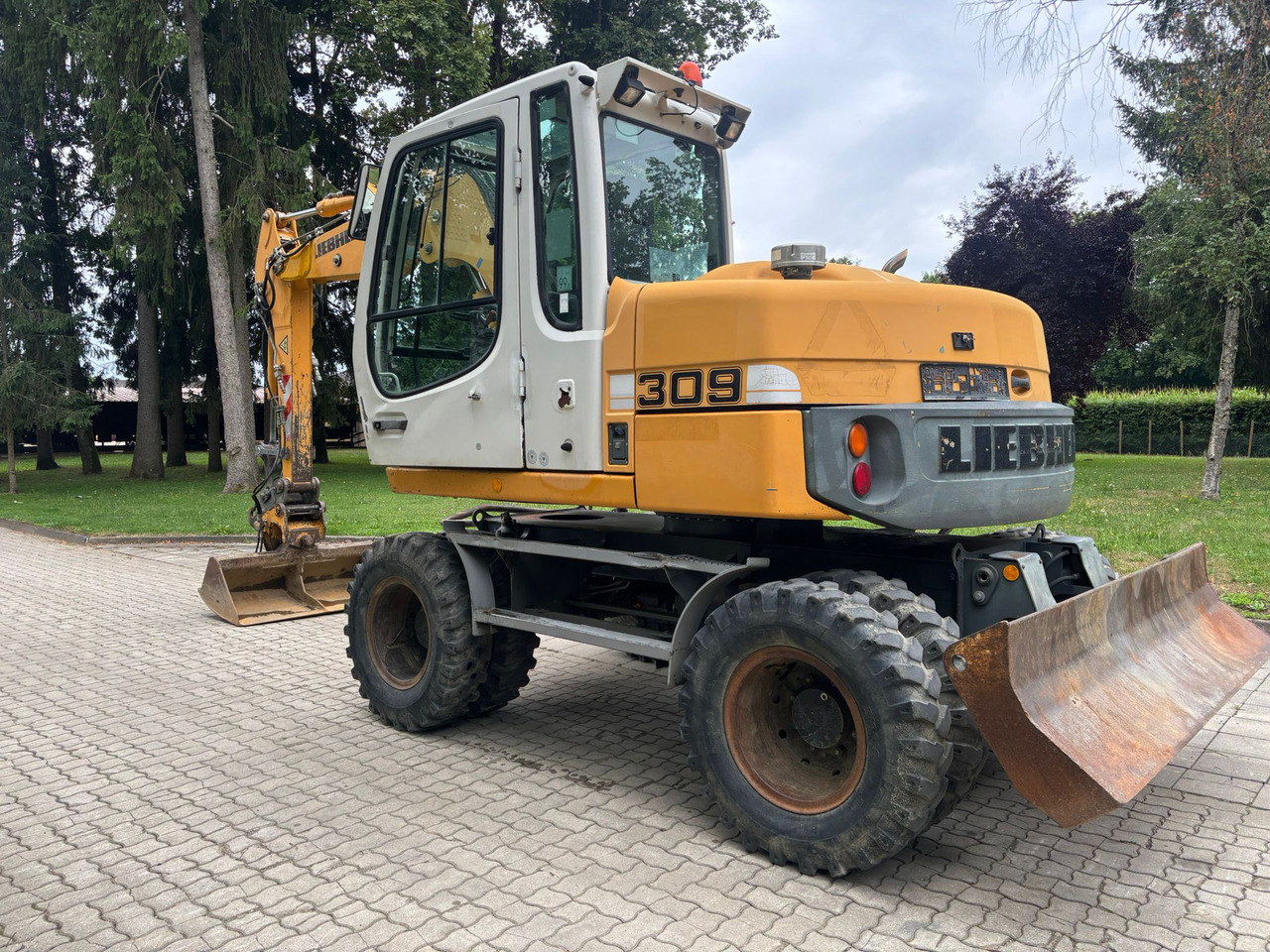 LIEBHERR A 309 Litronic - Pelle sur pneus: photos 5 LIEBHERR A 309 Litronic - Pelle sur pneus: photos 5