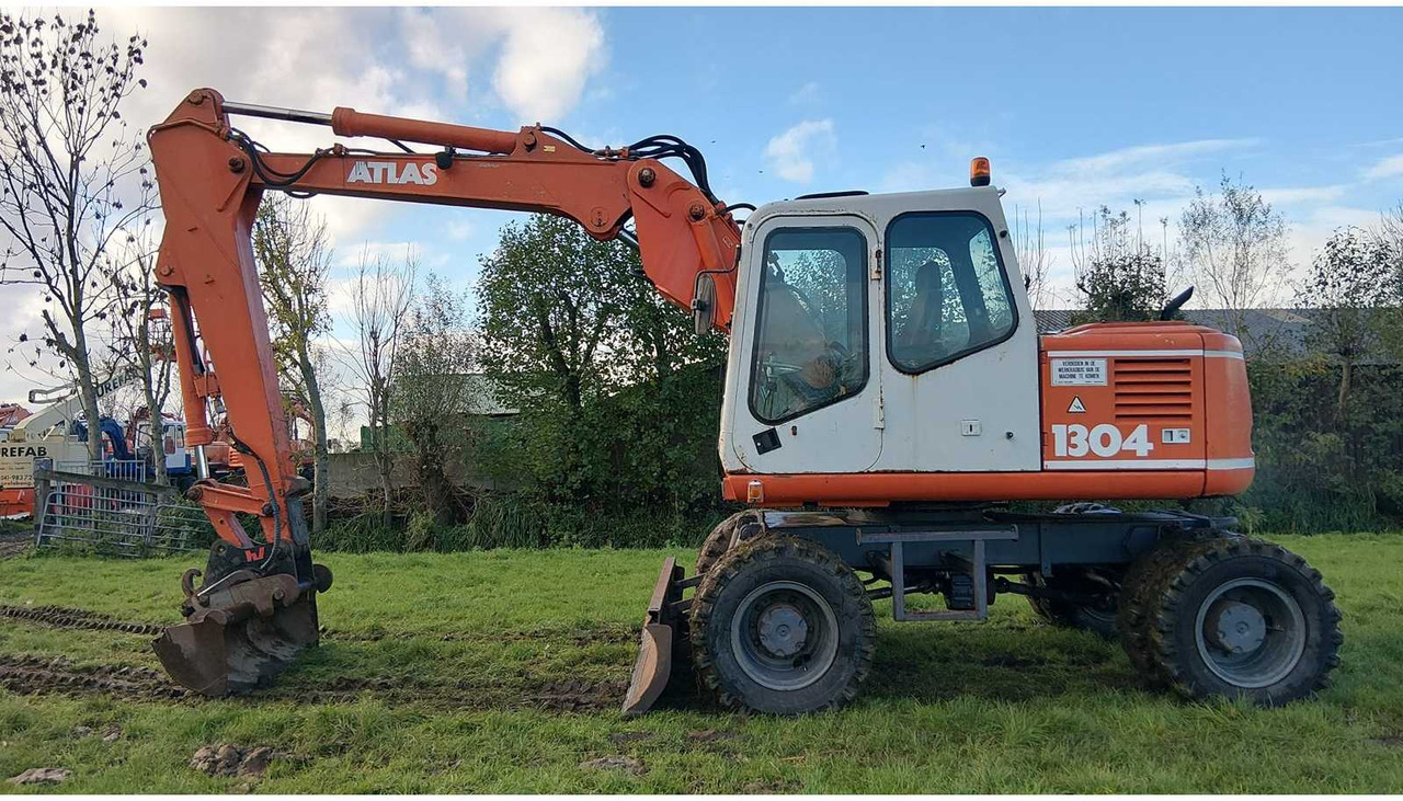 1994 ATLAS 1304 WHEELED EXCAVATOR - Pelle sur pneus: photos 4 1994 ATLAS 1304 WHEELED EXCAVATOR - Pelle sur pneus: photos 4