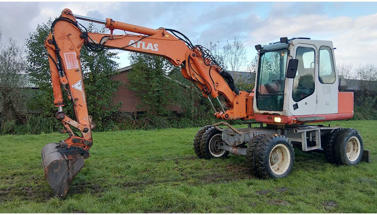 1996 ATLAS 1104 WHEELED EXCAVATOR - Pelle sur pneus: photos 1 1996 ATLAS 1104 WHEELED EXCAVATOR - Pelle sur pneus: photos 1