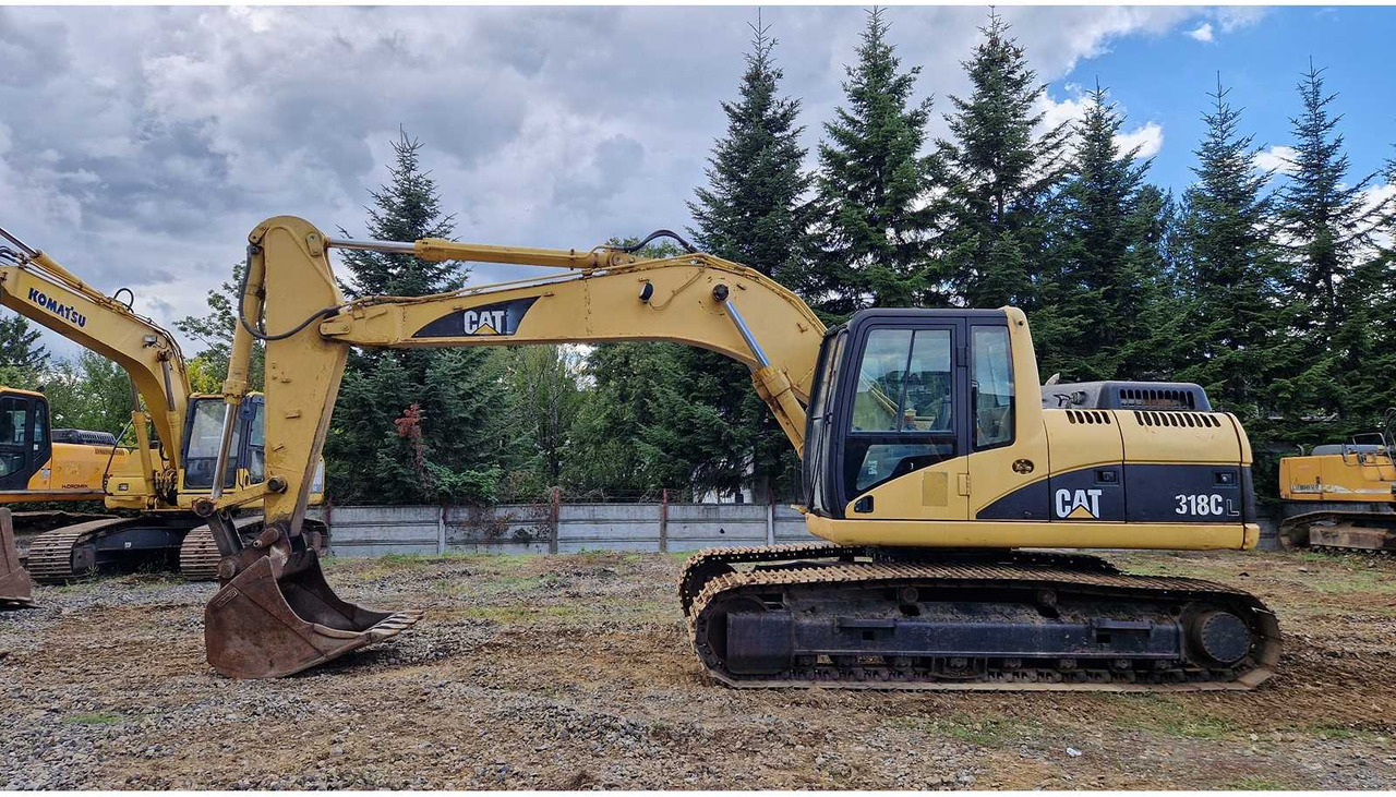 Caterpillar 318C - Pelle sur chenille: photos 1 Caterpillar 318C - Pelle sur chenille: photos 1