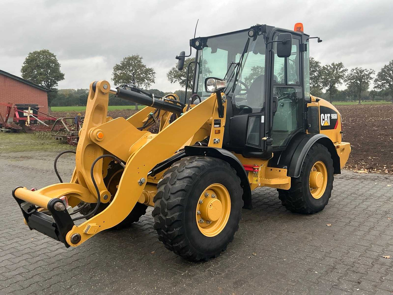 Caterpillar 906M - Chargeuse sur pneus: photos 1 Caterpillar 906M - Chargeuse sur pneus: photos 1