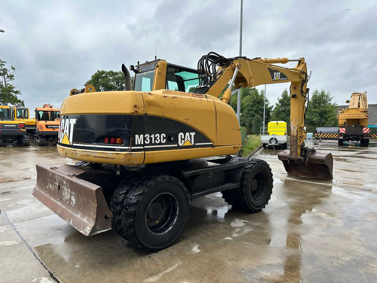 Caterpillar M313C - Pelle sur pneus: photos 4 Caterpillar M313C - Pelle sur pneus: photos 4