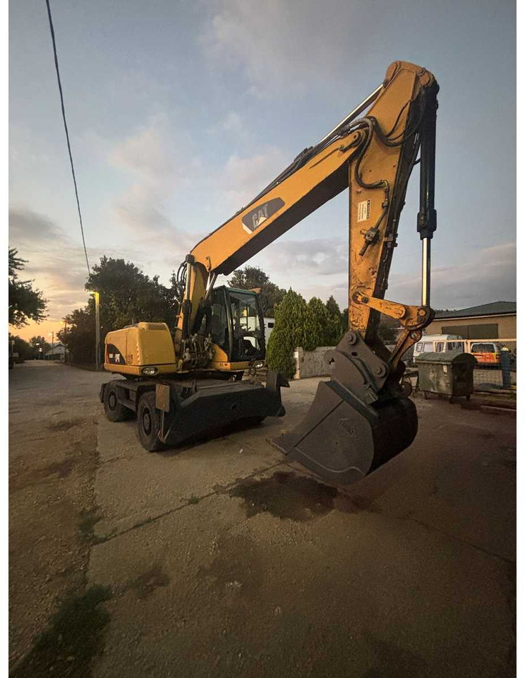 Caterpillar M316D - Pelle sur pneus: photos 3 Caterpillar M316D - Pelle sur pneus: photos 3