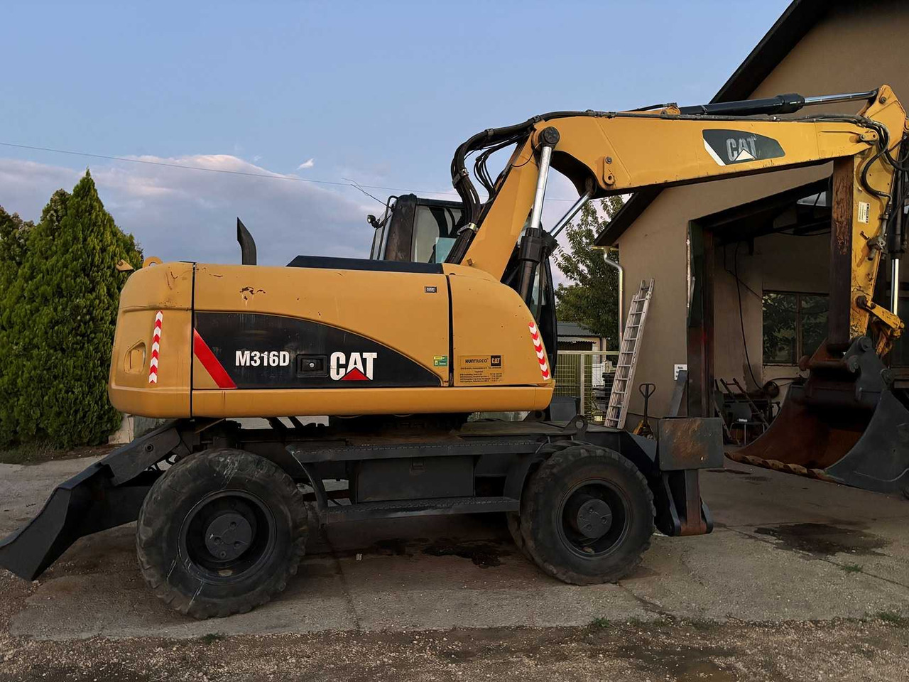 Caterpillar M316D - Pelle sur pneus: photos 1 Caterpillar M316D - Pelle sur pneus: photos 1