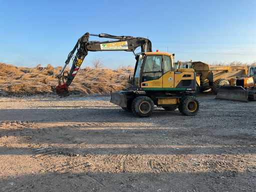 Volvo EXCAVATOR EW140D - Pelle sur pneus: photos 2 Volvo EXCAVATOR EW140D - Pelle sur pneus: photos 2