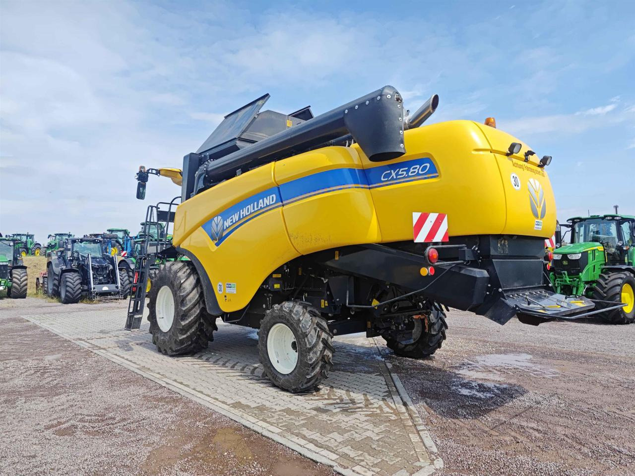 New Holland CX 5.80 - Moissonneuse-batteuse: photos 4 New Holland CX 5.80 - Moissonneuse-batteuse: photos 4