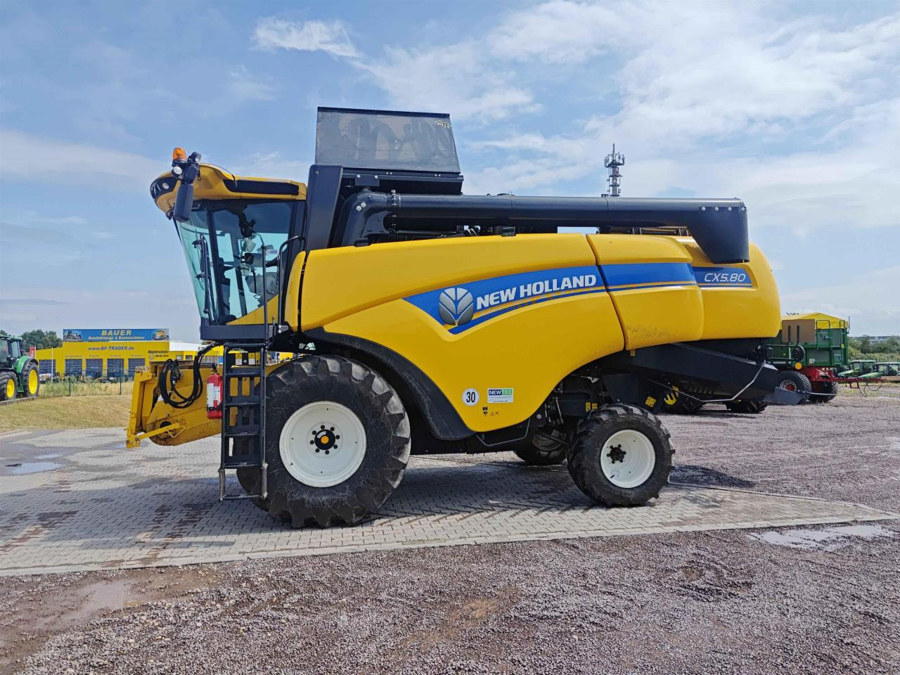 New Holland CX 5.80 - Moissonneuse-batteuse: photos 3 New Holland CX 5.80 - Moissonneuse-batteuse: photos 3