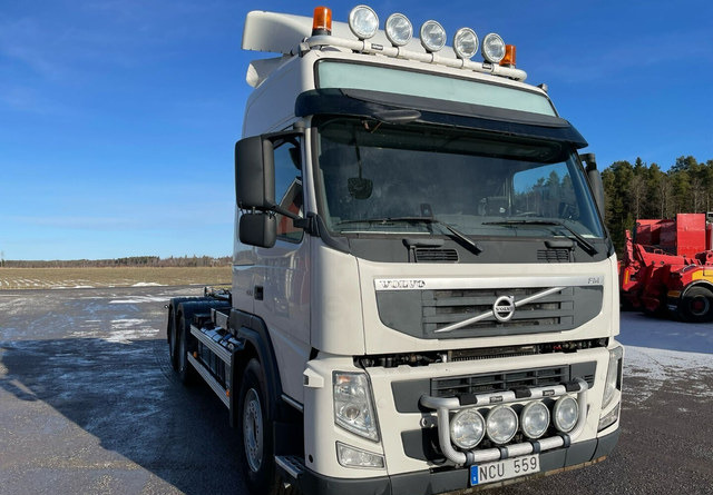 Volvo FM460 6X4 KOUKKUAUTO - Camion ampliroll: photos 1 Volvo FM460 6X4 KOUKKUAUTO - Camion ampliroll: photos 1