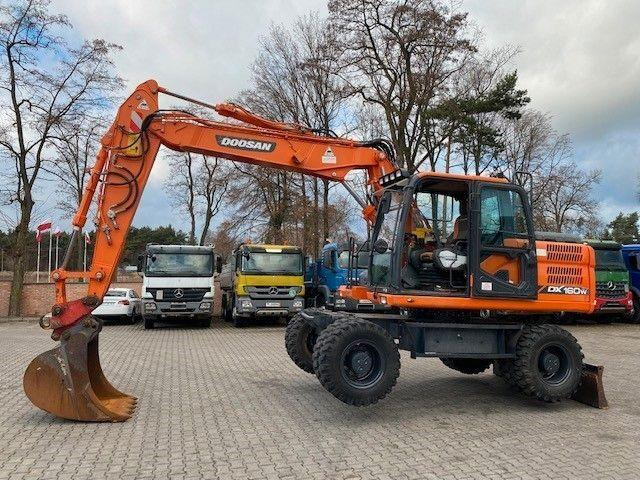 Doosan DX 160 W-3 - Pelle sur pneus: photos 5 Doosan DX 160 W-3 - Pelle sur pneus: photos 5