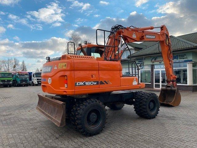 Doosan DX 160 W-3 - Pelle sur pneus: photos 3 Doosan DX 160 W-3 - Pelle sur pneus: photos 3