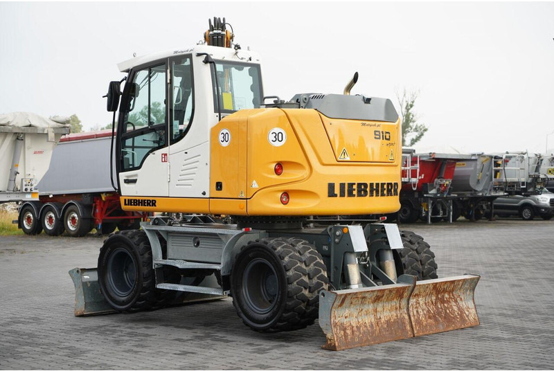 Liebherr 910 COMPACT LITRONIC / KOPARKA KOŁOWA / KLIMATYZACJA / KAMERA - Pelle sur pneus: photos 3 Liebherr 910 COMPACT LITRONIC / KOPARKA KOŁOWA / KLIMATYZACJA / KAMERA - Pelle sur pneus: photos 3
