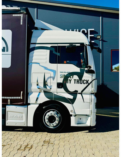 Camion à rideaux coulissants MAN TGX 26.420: photos 15 Camion à rideaux coulissants MAN TGX 26.420: photos 15