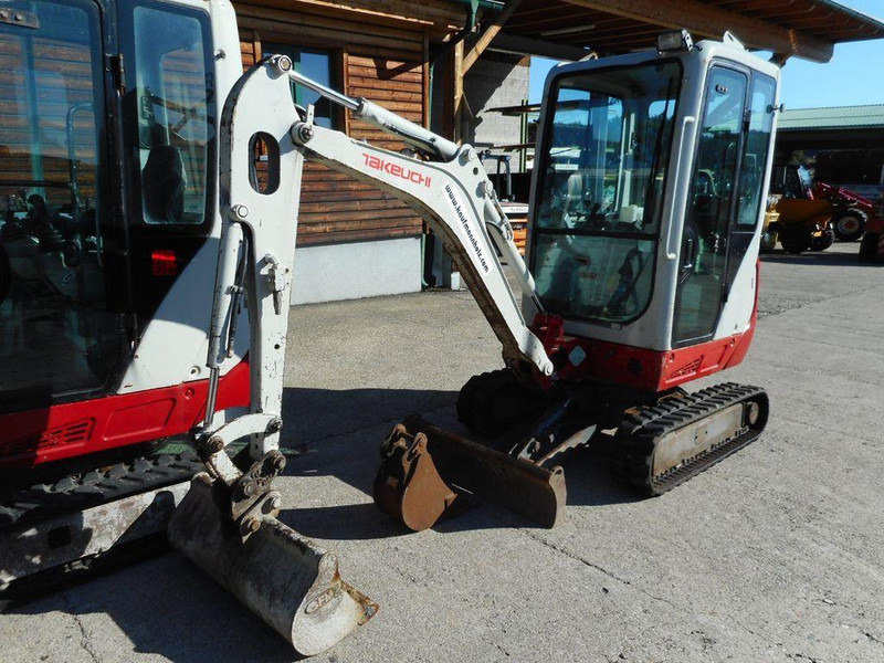 Takeuchi TB 216 Mini lánctalpas forgó-kotró - Pelle sur chenille: photos 1 Takeuchi TB 216 Mini lánctalpas forgó-kotró - Pelle sur chenille: photos 1