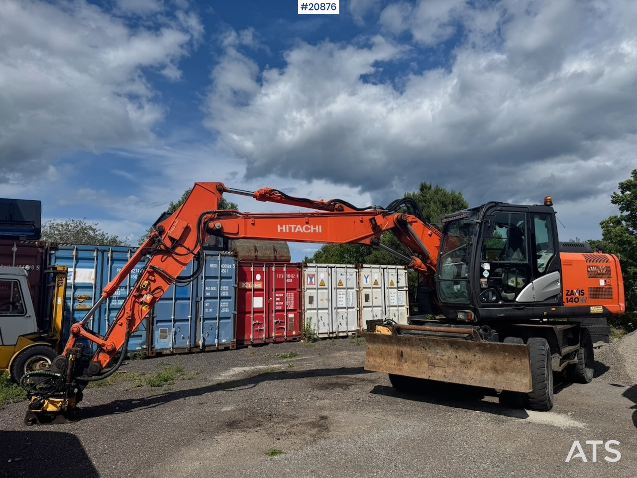Hitachi ZX140W-5B - Pelle sur pneus: photos 2 Hitachi ZX140W-5B - Pelle sur pneus: photos 2