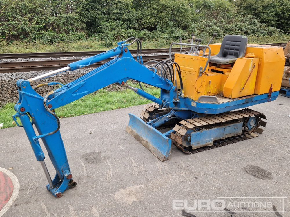 Komatsu PC05 - Mini pelle: photos 1 Komatsu PC05 - Mini pelle: photos 1