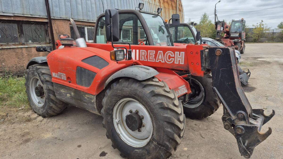 MANITOU MLT730 TURBO 1999 - Chariot télescopique: photos 1 MANITOU MLT730 TURBO 1999 - Chariot télescopique: photos 1