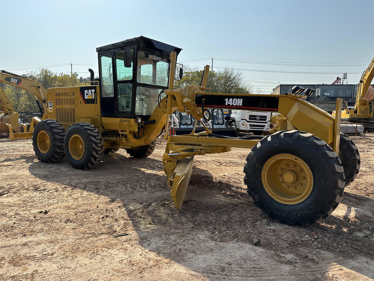 Niveleuse CATERPILLAR 140H: photos 1