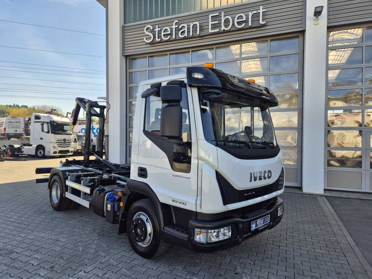 Iveco Eurocargo ML80E21K 4x2 Hyva 05-32-K-DIN-BF 2xAHK - Camion ampliroll: photos 1 Iveco Eurocargo ML80E21K 4x2 Hyva 05-32-K-DIN-BF 2xAHK - Camion ampliroll: photos 1