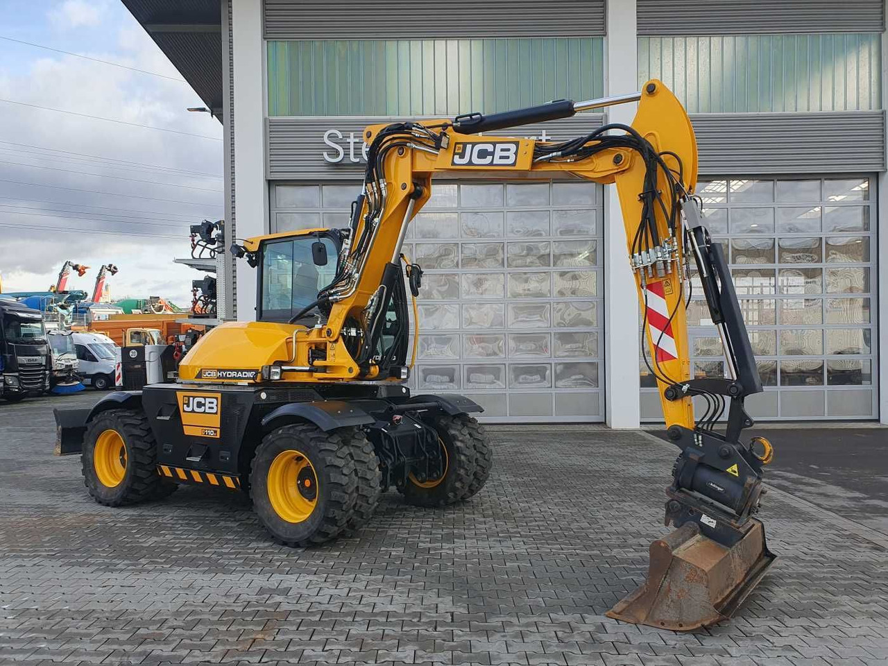 JCB Hydradig HD 110WT / 2022 / nur 239h! / Powertilt - Pelle sur pneus: photos 1 JCB Hydradig HD 110WT / 2022 / nur 239h! / Powertilt - Pelle sur pneus: photos 1