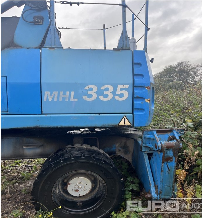 2011 Fuchs-Terex MHL335 - Pelle sur pneus: photos 5 2011 Fuchs-Terex MHL335 - Pelle sur pneus: photos 5
