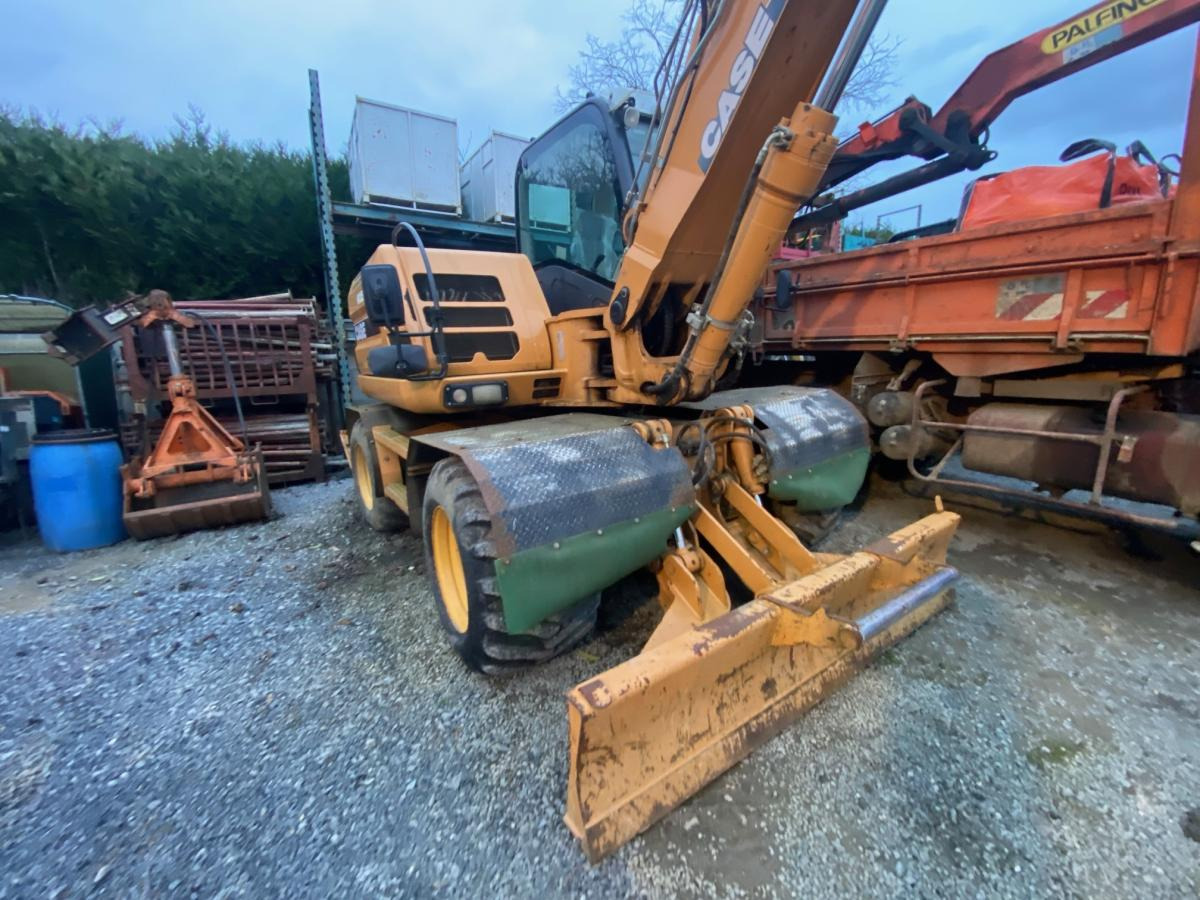 Case WX125 - Pelle sur pneus: photos 3 Case WX125 - Pelle sur pneus: photos 3