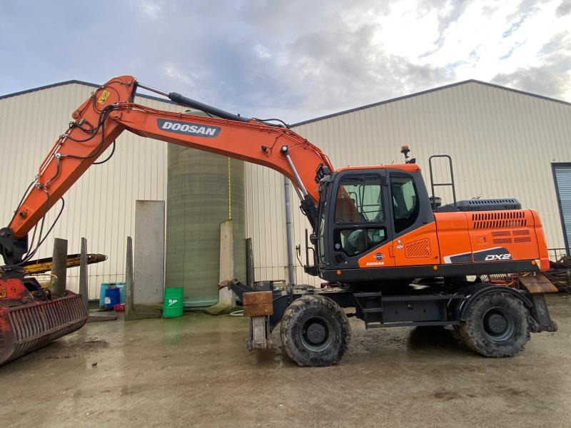 Doosan DX 210W-5 - Pelle sur pneus: photos 5 Doosan DX 210W-5 - Pelle sur pneus: photos 5