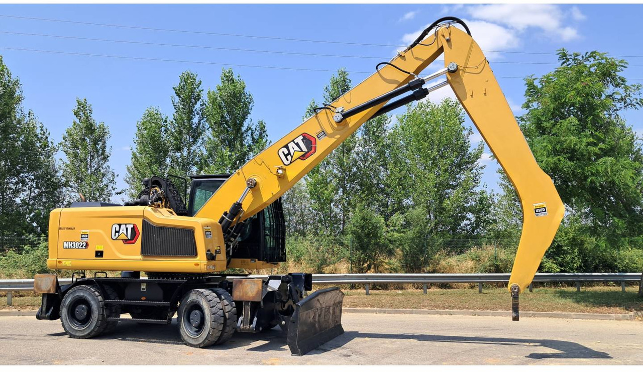 CAT MH3022-1 - Pelle sur pneus: photos 2 CAT MH3022-1 - Pelle sur pneus: photos 2
