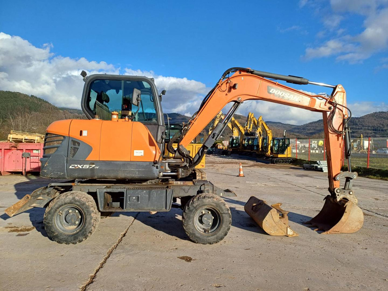 Pelle sur pneus DOOSAN INFRACORE AMERICA CORP. DX57W-7: photos 11
