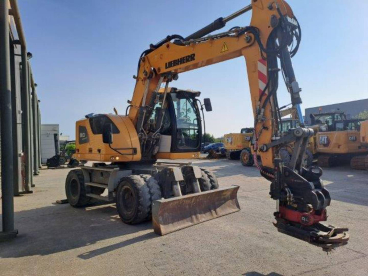 LIEBHERR A913 - Pelle sur pneus: photos 2 LIEBHERR A913 - Pelle sur pneus: photos 2