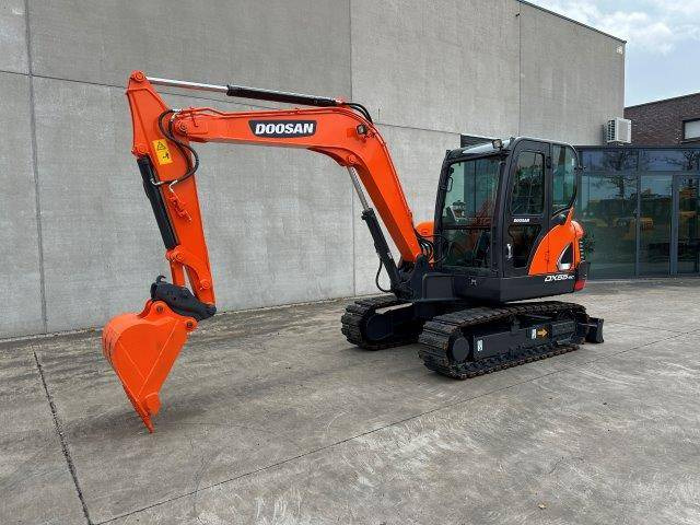 Doosan DX55-9C - Pelle sur chenille: photos 1 Doosan DX55-9C - Pelle sur chenille: photos 1