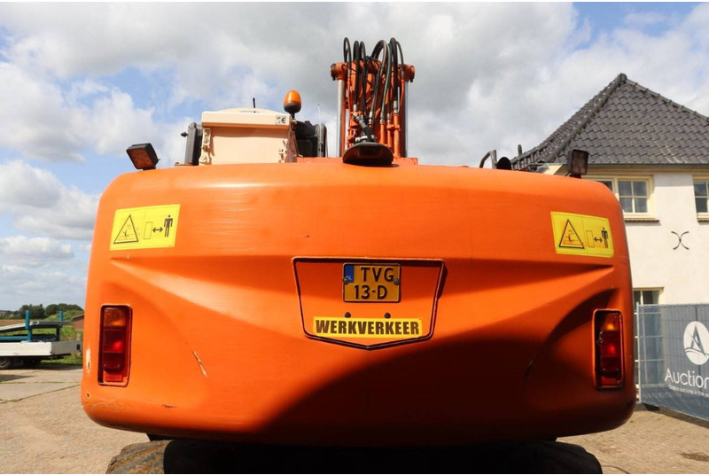 Hitachi ZX140W-3 - Pelle sur pneus: photos 5 Hitachi ZX140W-3 - Pelle sur pneus: photos 5