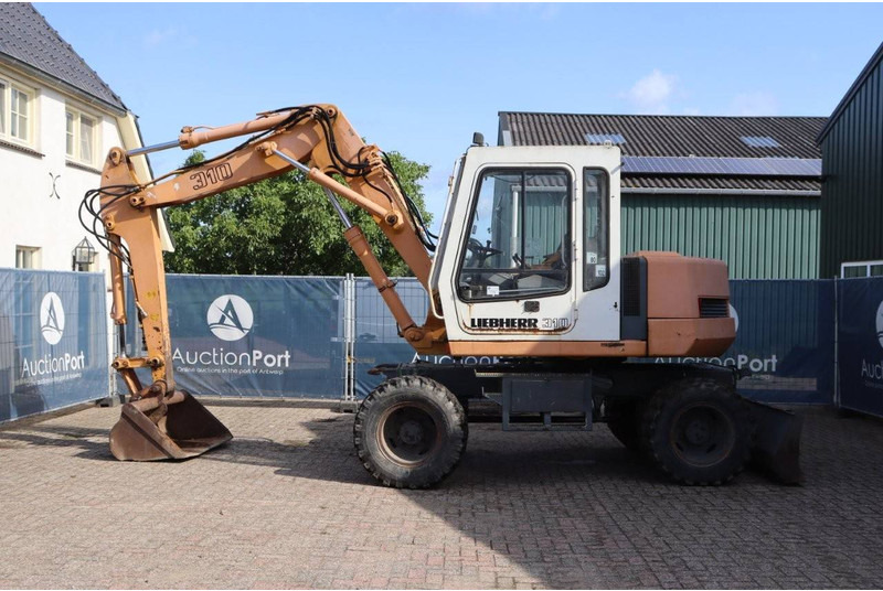 Liebherr A 310 - Pelle sur pneus: photos 2 Liebherr A 310 - Pelle sur pneus: photos 2