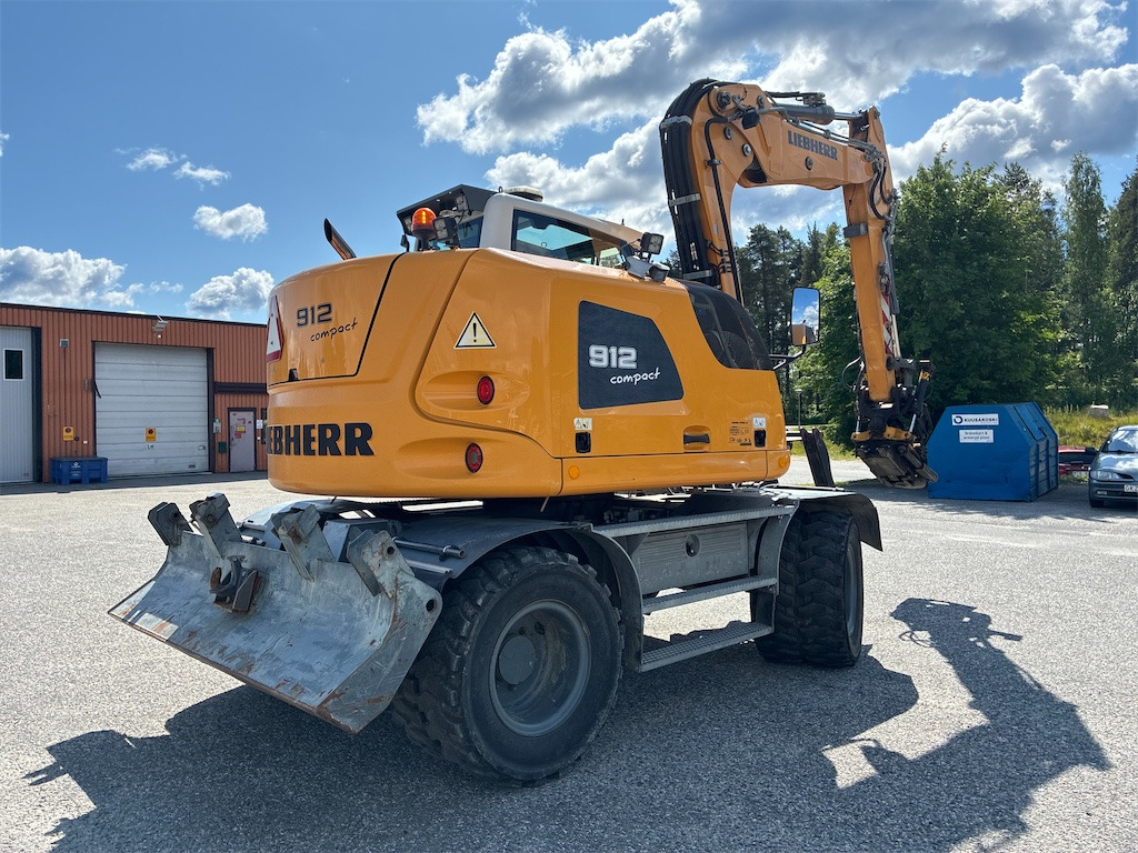 Liebherr 912 Compact - Pelle sur pneus: photos 5 Liebherr 912 Compact - Pelle sur pneus: photos 5