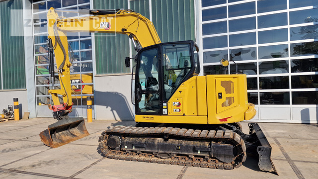 Cat 310 - Mini pelle: photos 2 Cat 310 - Mini pelle: photos 2