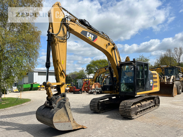 Cat 318EL - Pelle sur chenille: photos 1 Cat 318EL - Pelle sur chenille: photos 1