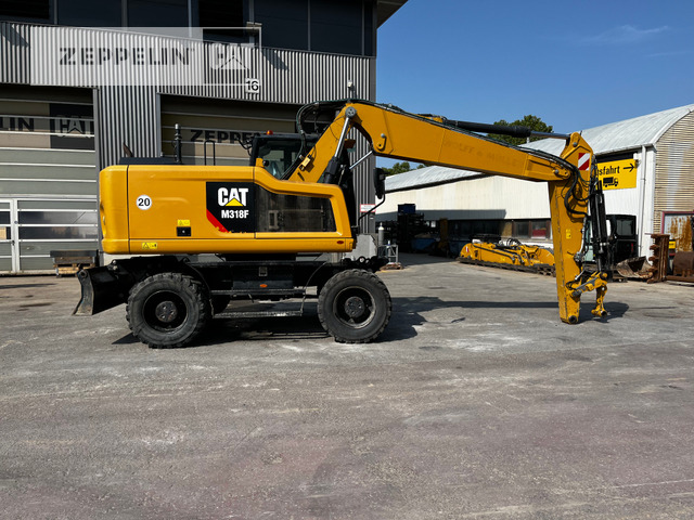 Cat M318F - Pelle sur pneus: photos 5 Cat M318F - Pelle sur pneus: photos 5