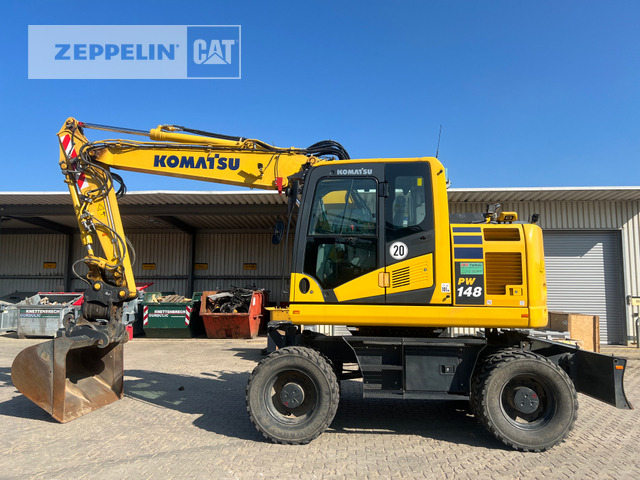 Komatsu PW148-11 - Pelle sur pneus: photos 1 Komatsu PW148-11 - Pelle sur pneus: photos 1