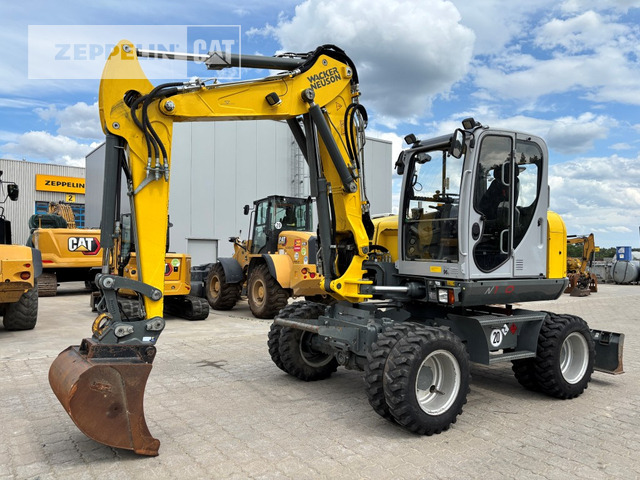 Wacker EW100 - Pelle sur pneus: photos 1 Wacker EW100 - Pelle sur pneus: photos 1