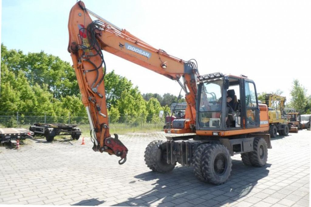 Doosan Mobilbagger DX 160 Mobilbagger - Pelle sur pneus: photos 2 Doosan Mobilbagger DX 160 Mobilbagger - Pelle sur pneus: photos 2