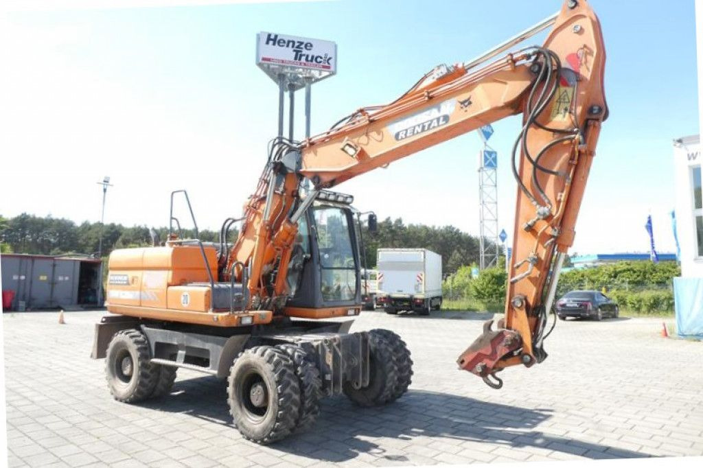Doosan Mobilbagger DX 160 Mobilbagger - Pelle sur pneus: photos 1 Doosan Mobilbagger DX 160 Mobilbagger - Pelle sur pneus: photos 1