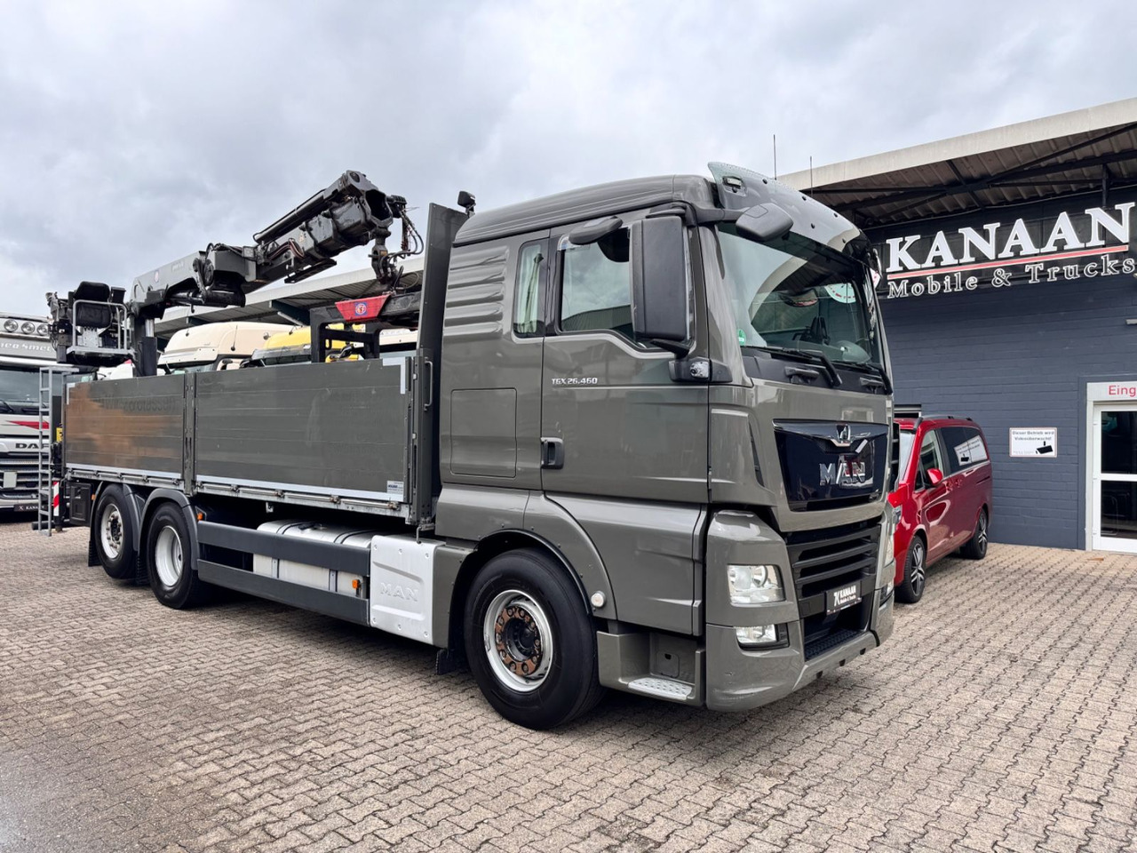 MAN 26.460 TGX Baustoffkran HMF 2110-L3 - Camion grue: photos 1 MAN 26.460 TGX Baustoffkran HMF 2110-L3 - Camion grue: photos 1