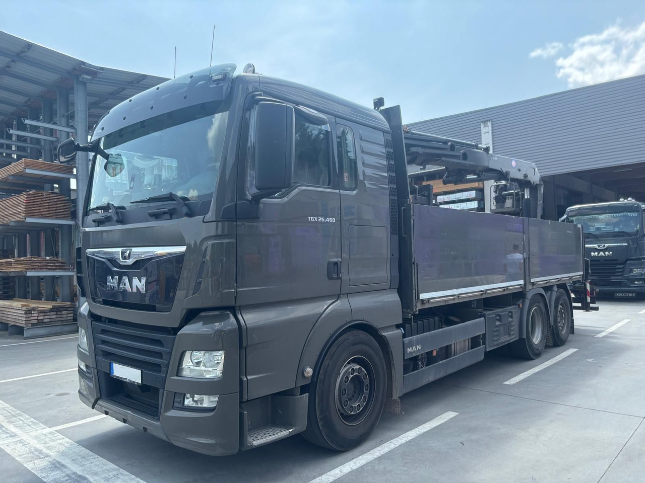 MAN 26.460 TGX Baustoffkran HMF 2110-L3 - Camion grue: photos 1 MAN 26.460 TGX Baustoffkran HMF 2110-L3 - Camion grue: photos 1